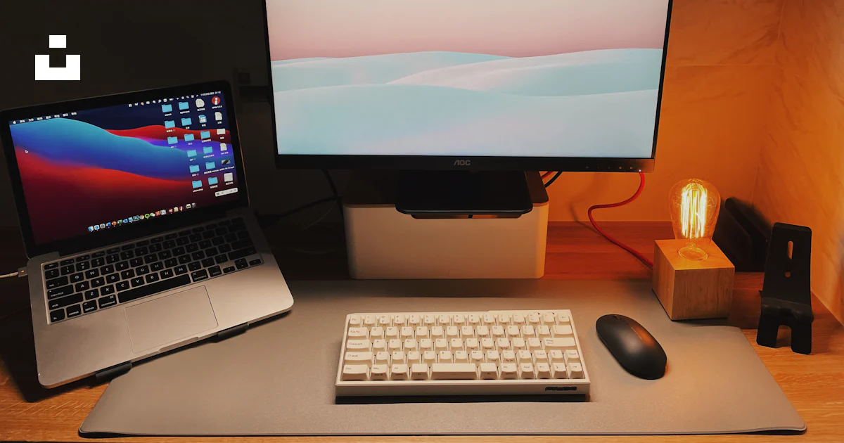 Unsplash Main Using Computer A desk with a laptop and a computer monitor photo – Free Computer Image ...