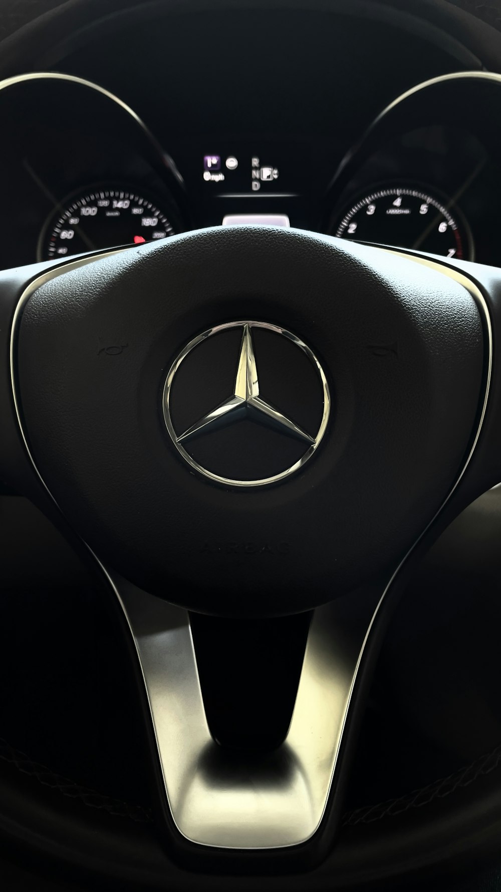 the steering wheel of a mercedes benz benz benz benz benz benz benz benz benz benz