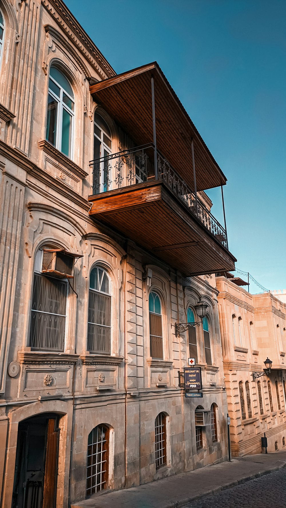 an old building with a balcony and balconies