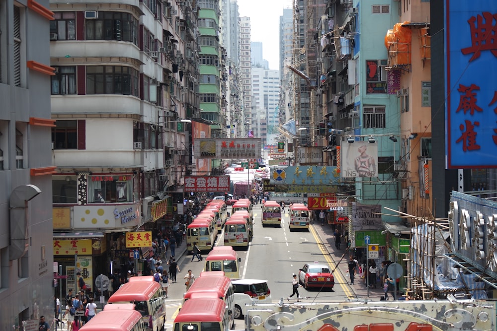 a city street filled with lots of tall buildings