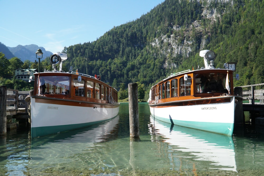 a couple of boats that are sitting in the water