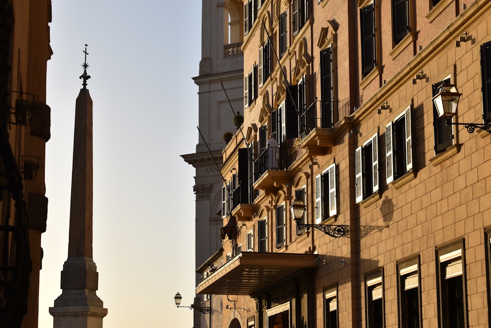 a tall building with a clock on the side of it