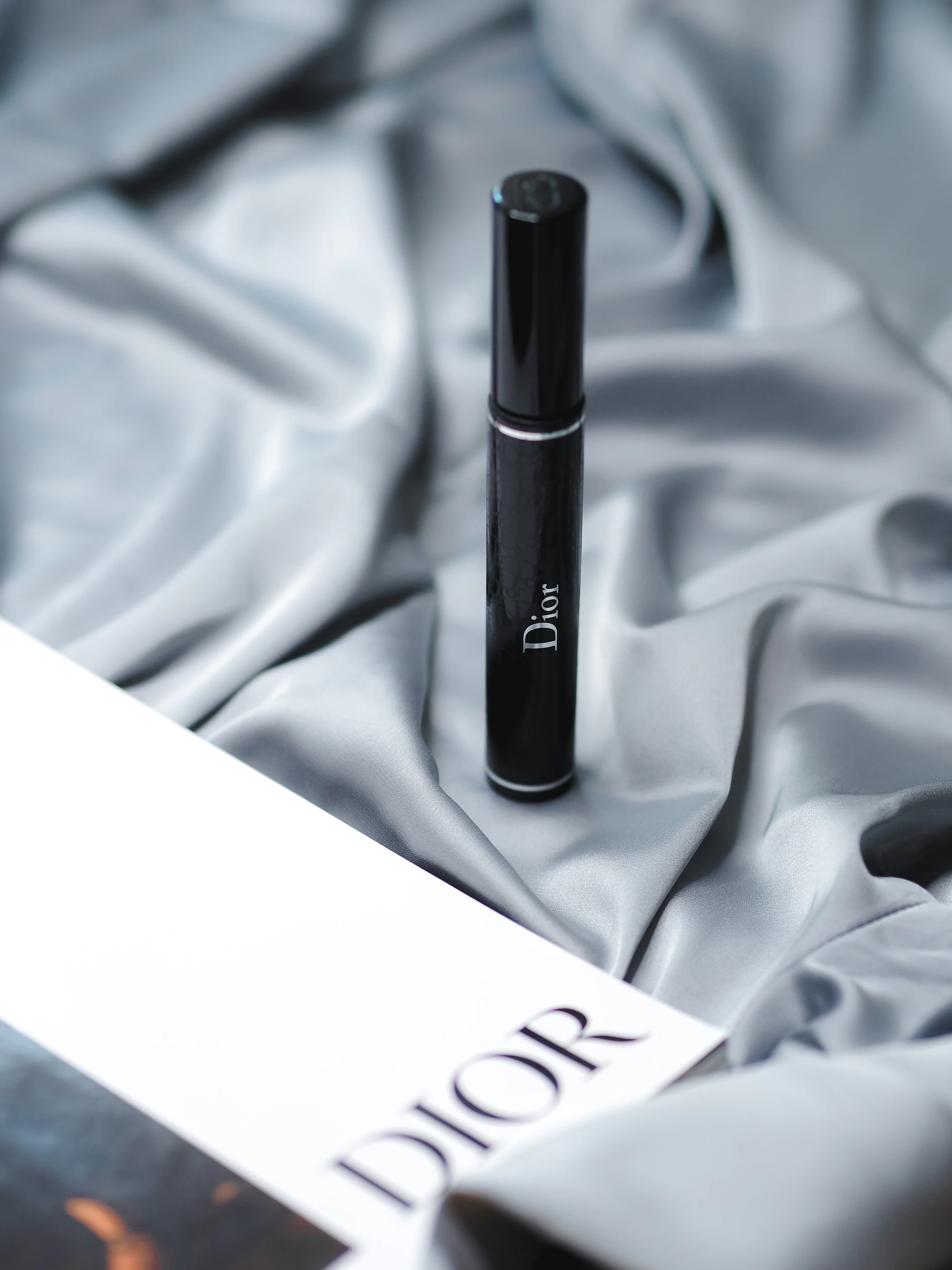 black tube type vape on white textile