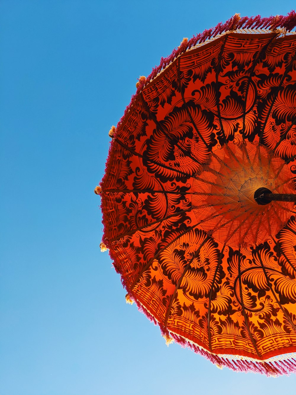 orange and black floral round lantern