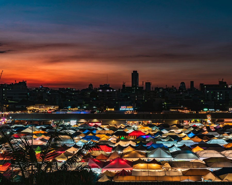 Bangkok night market tents lit up