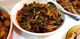 A colorful vegetable stir-fry served in a bowl.