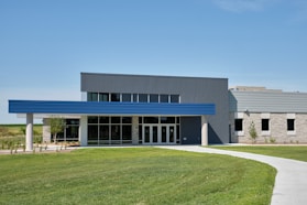 a large building with a blue awning on top of it