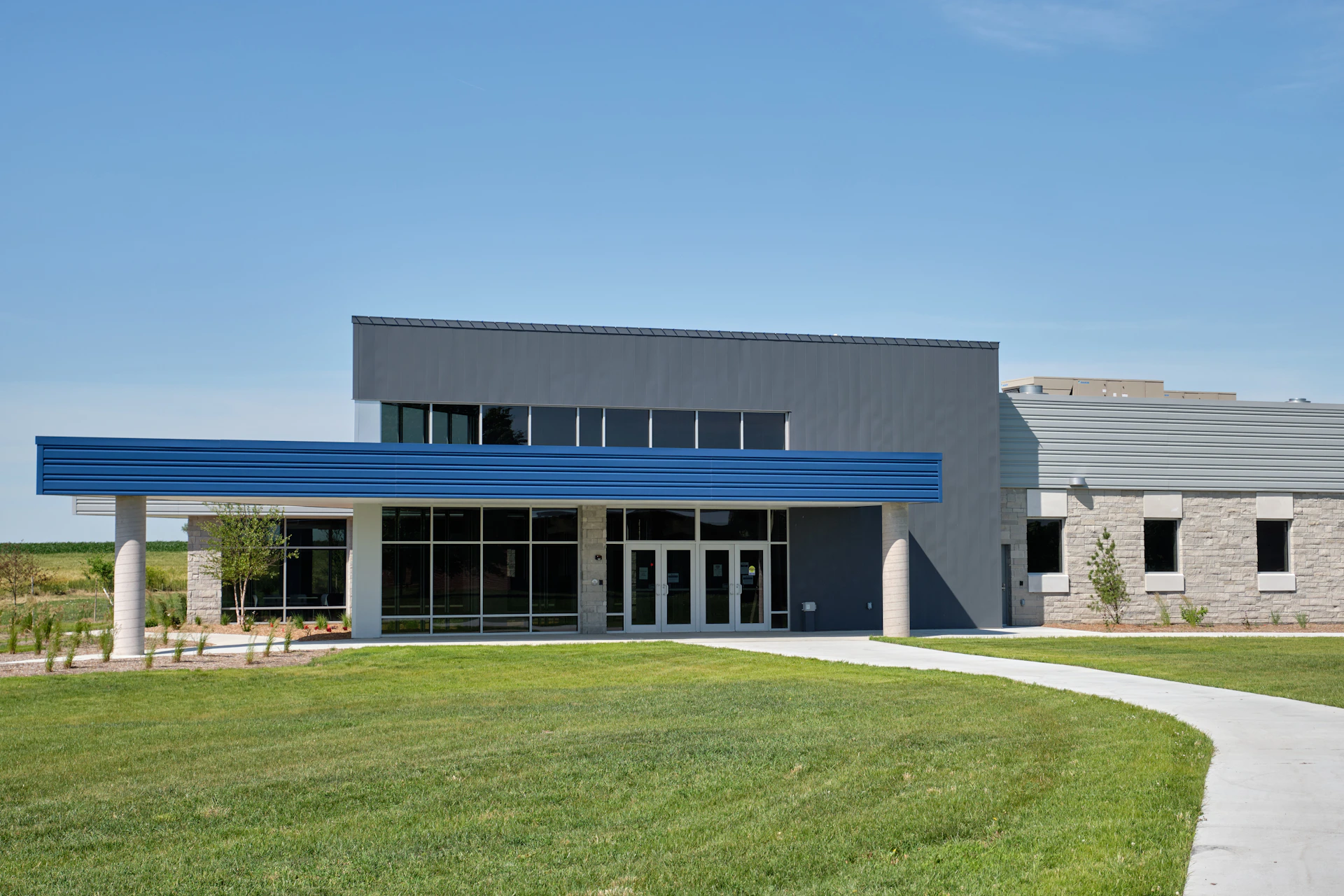 a large building with a blue awning on top of it