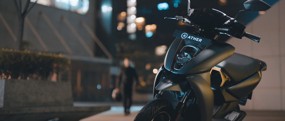 black and gray motorcycle on road during night time