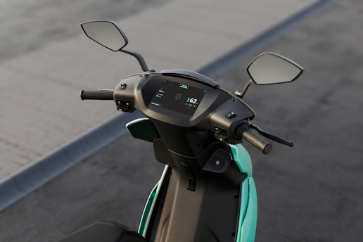 black and green motorcycle with green cover