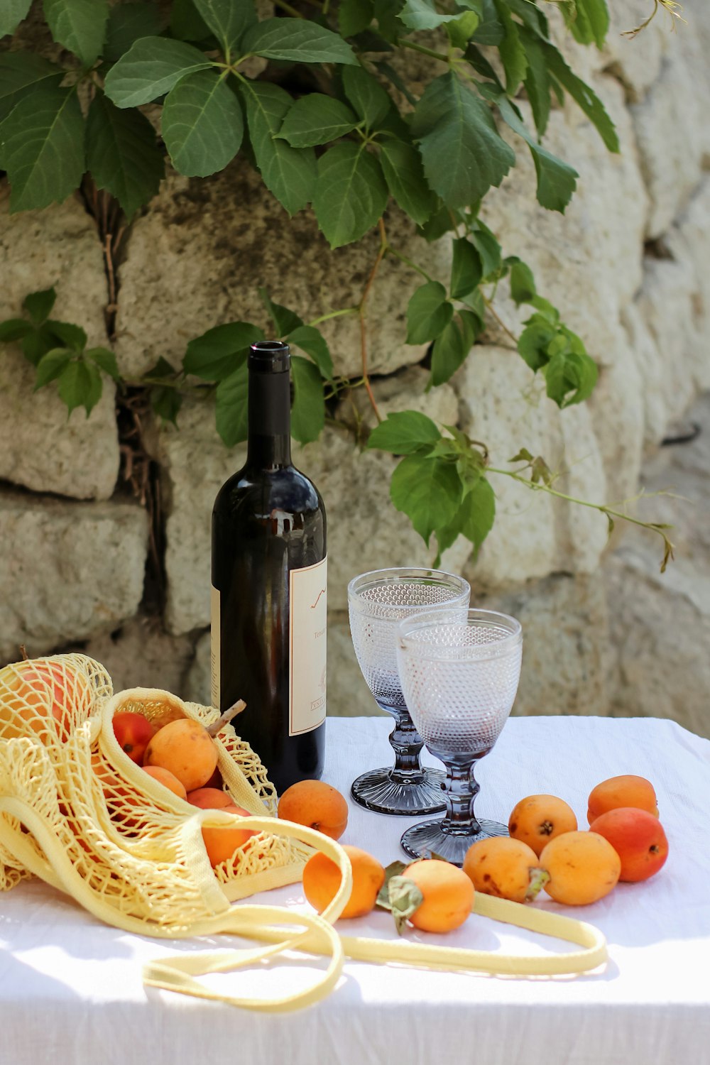 sliced orange fruit on white table