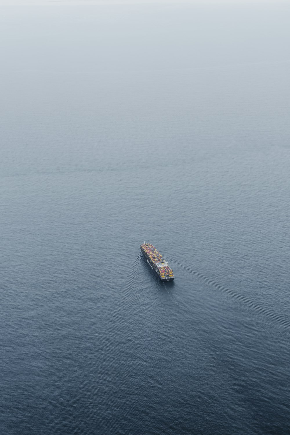 aerial view of boat on sea during daytime