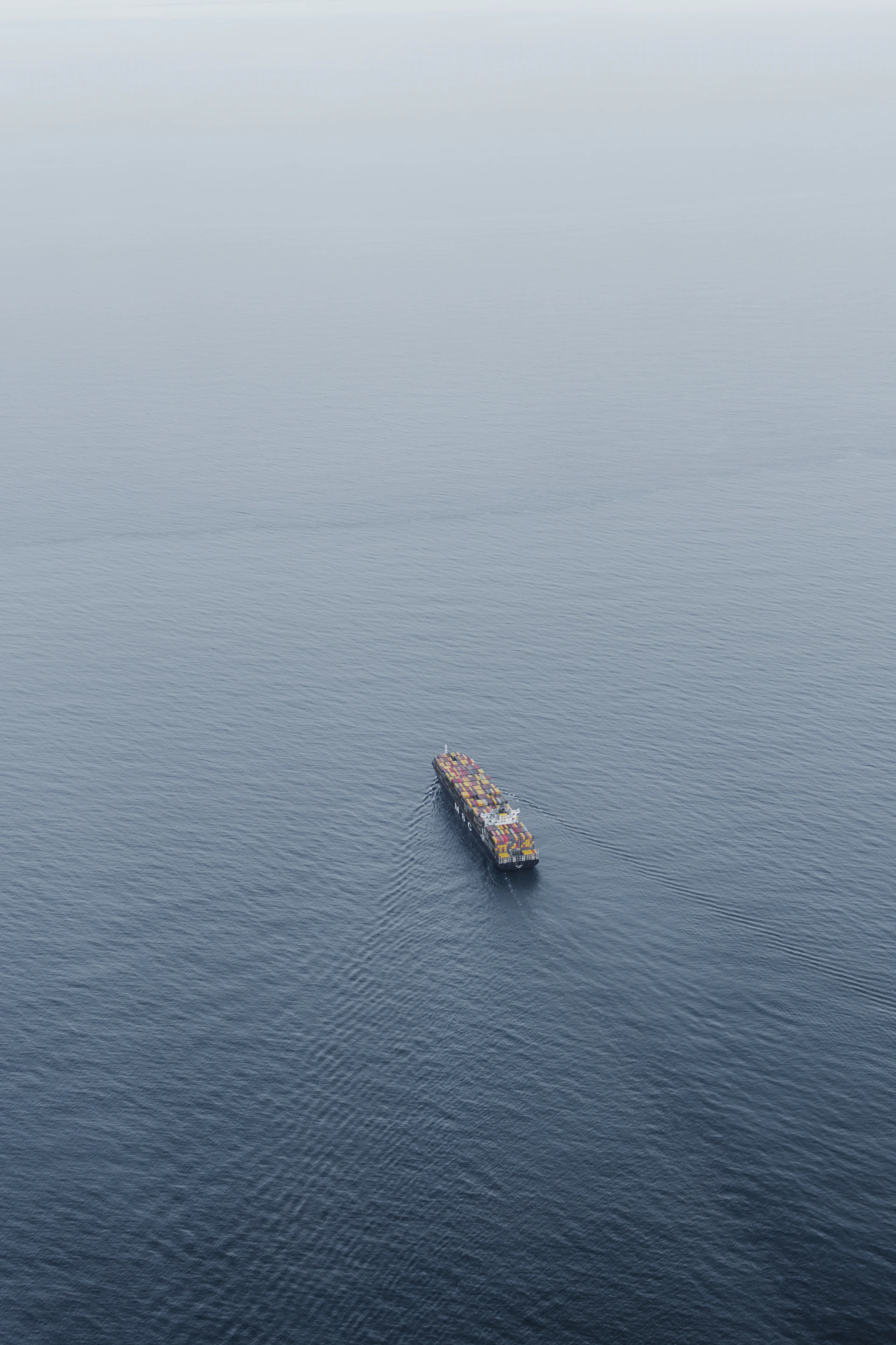 aerial view of boat on sea during daytime