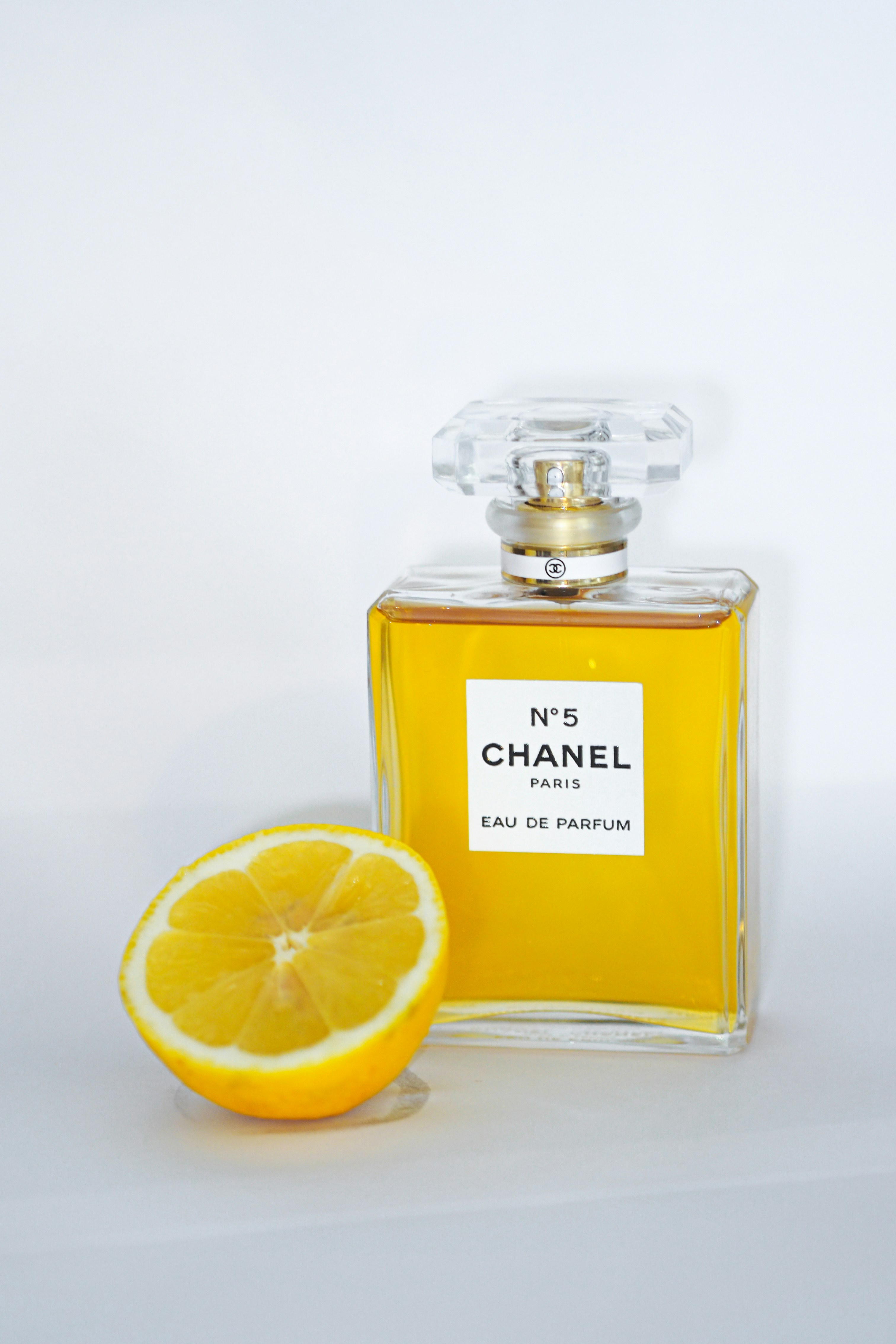 lemon juice in clear glass bottle
