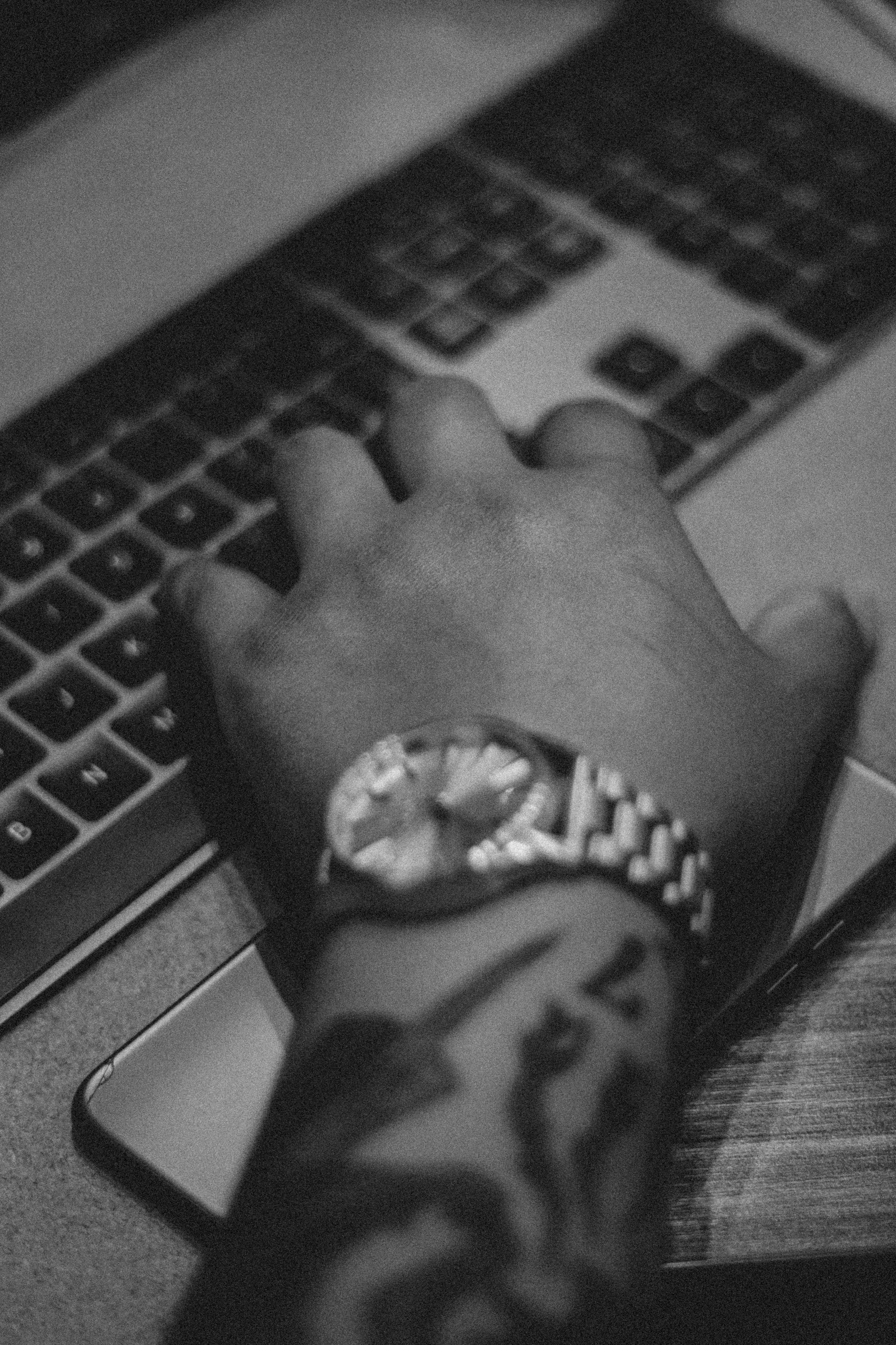 person wearing black and white watch