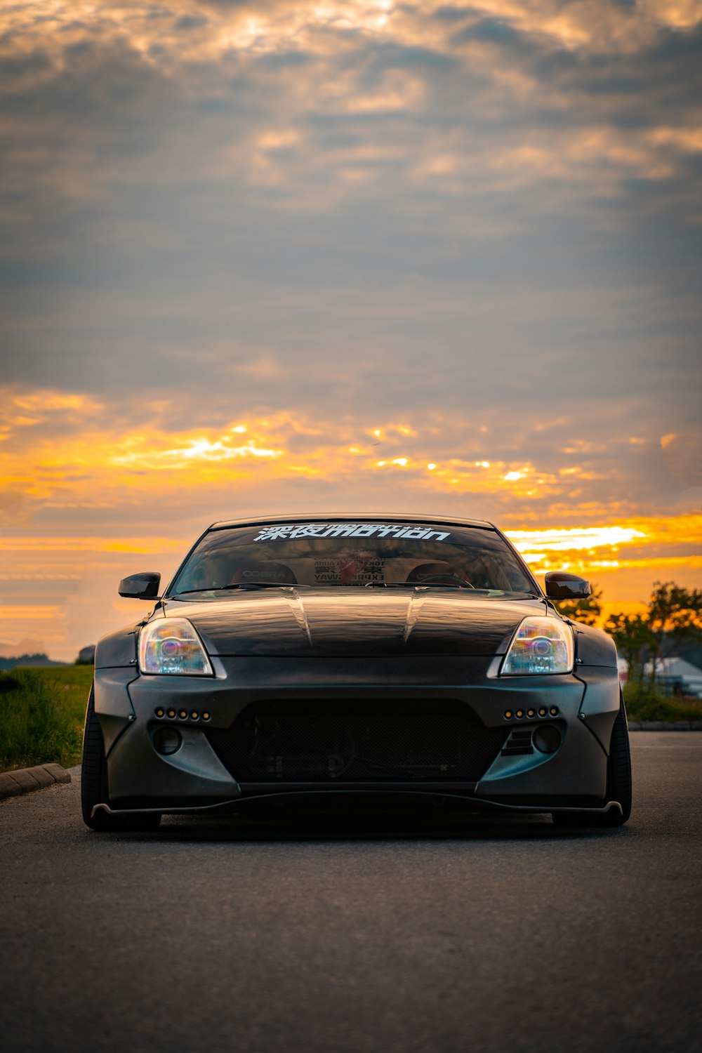 black bmw m 3 coupe on road during sunset