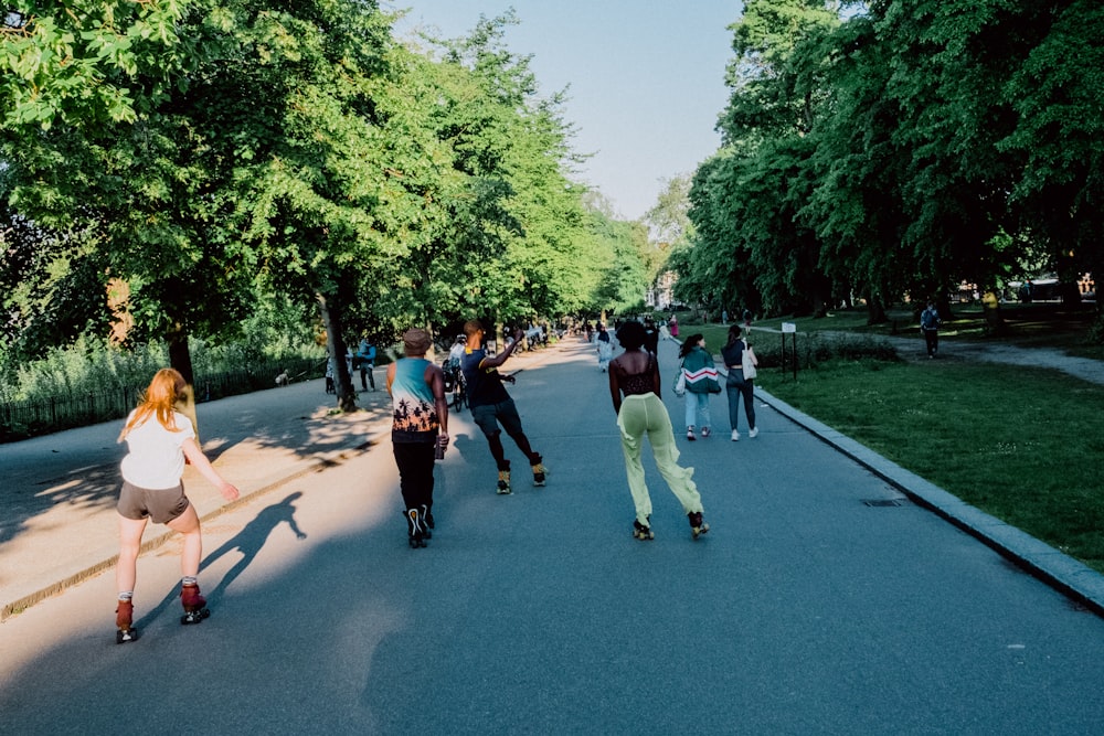 people walking on gray concrete road during daytime