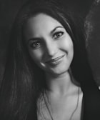 A professional portrait of a smiling businesswoman.