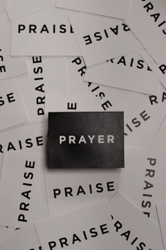 Hands holding a heartfelt prayer request card