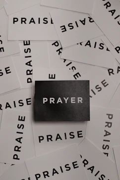 Hands holding a heartfelt prayer request card