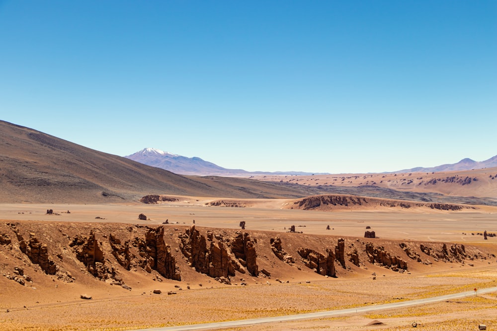 brown mountain under blue sky during daytime