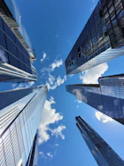 a group of tall buildings standing next to each other