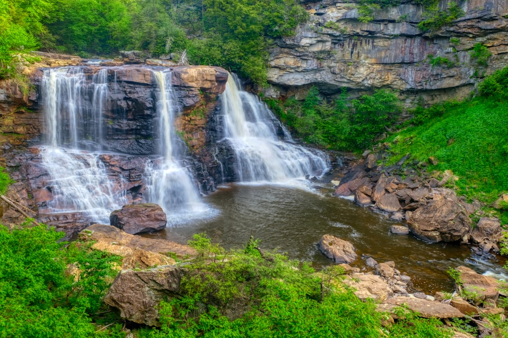 waterfalls in the middle of the forest