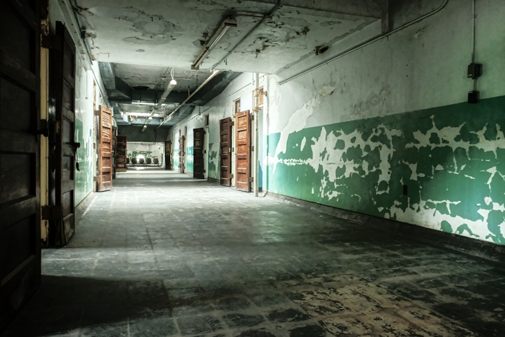 empty hallway with green and white wall