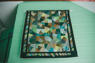 blue green and white textile