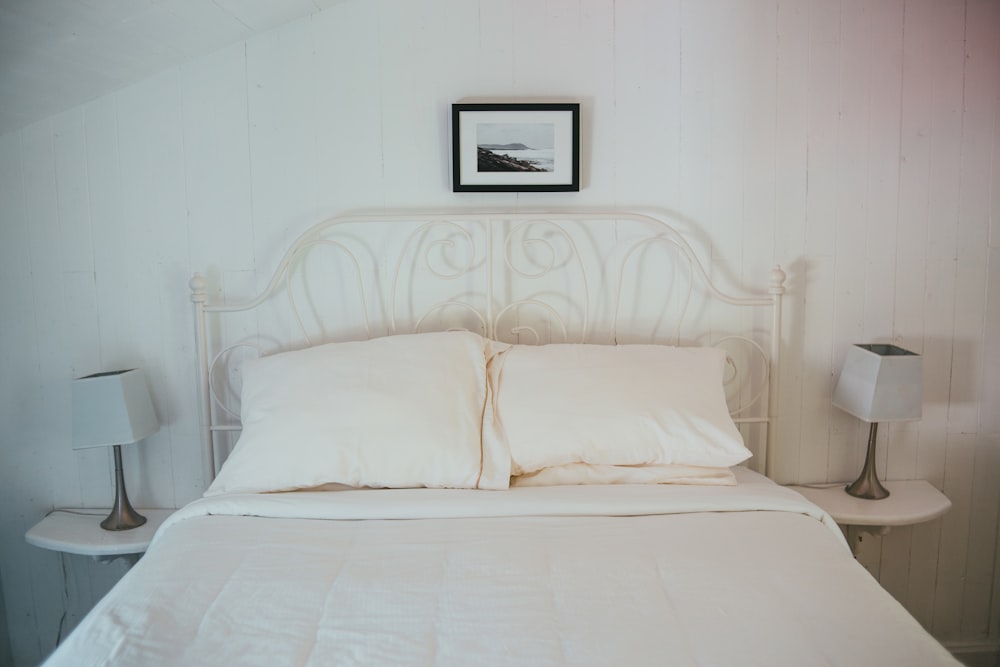 white bed with white bed linen