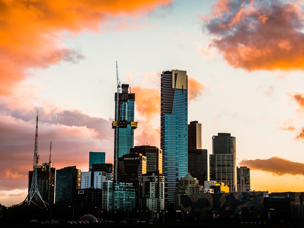 a view of a city skyline at sunset