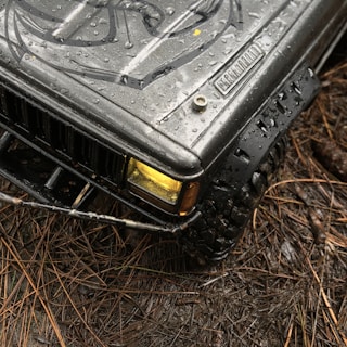Green ride-on jeep featuring rugged design and a fun steering wheel