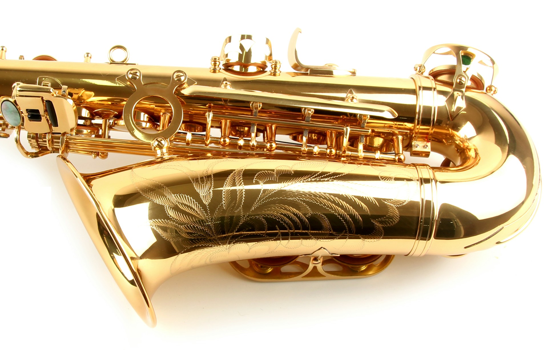 Close-up of a golden saxophone being played passionately during an elegant event.