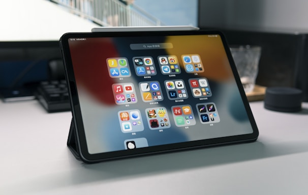 a tablet computer sitting on top of a table