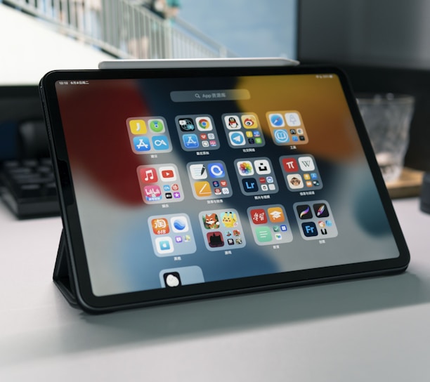 a tablet computer sitting on top of a table