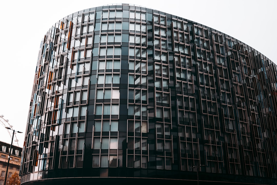 black glass walled high rise building