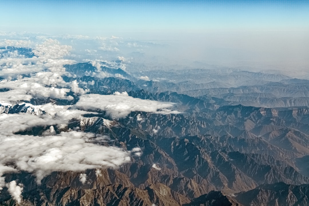 aerial view of mountains and clouds