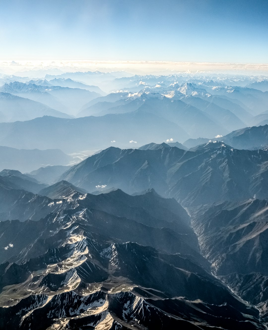 black and white mountains under white sky during daytime