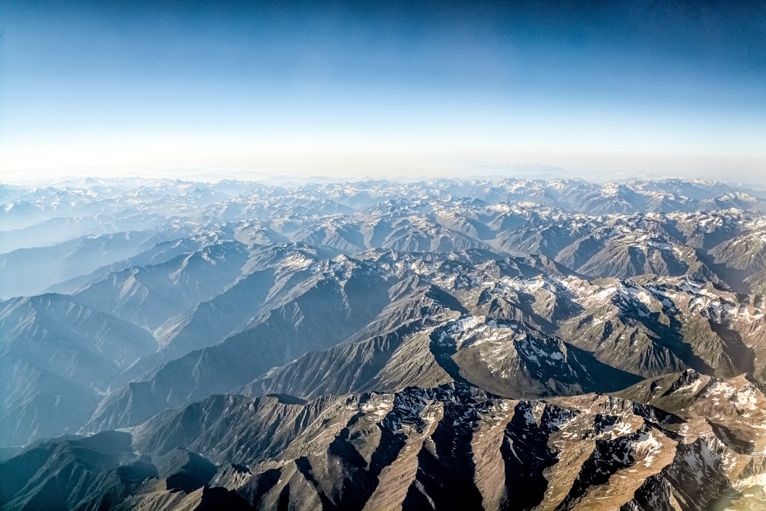 aerial view of snow covered mountains during daytime