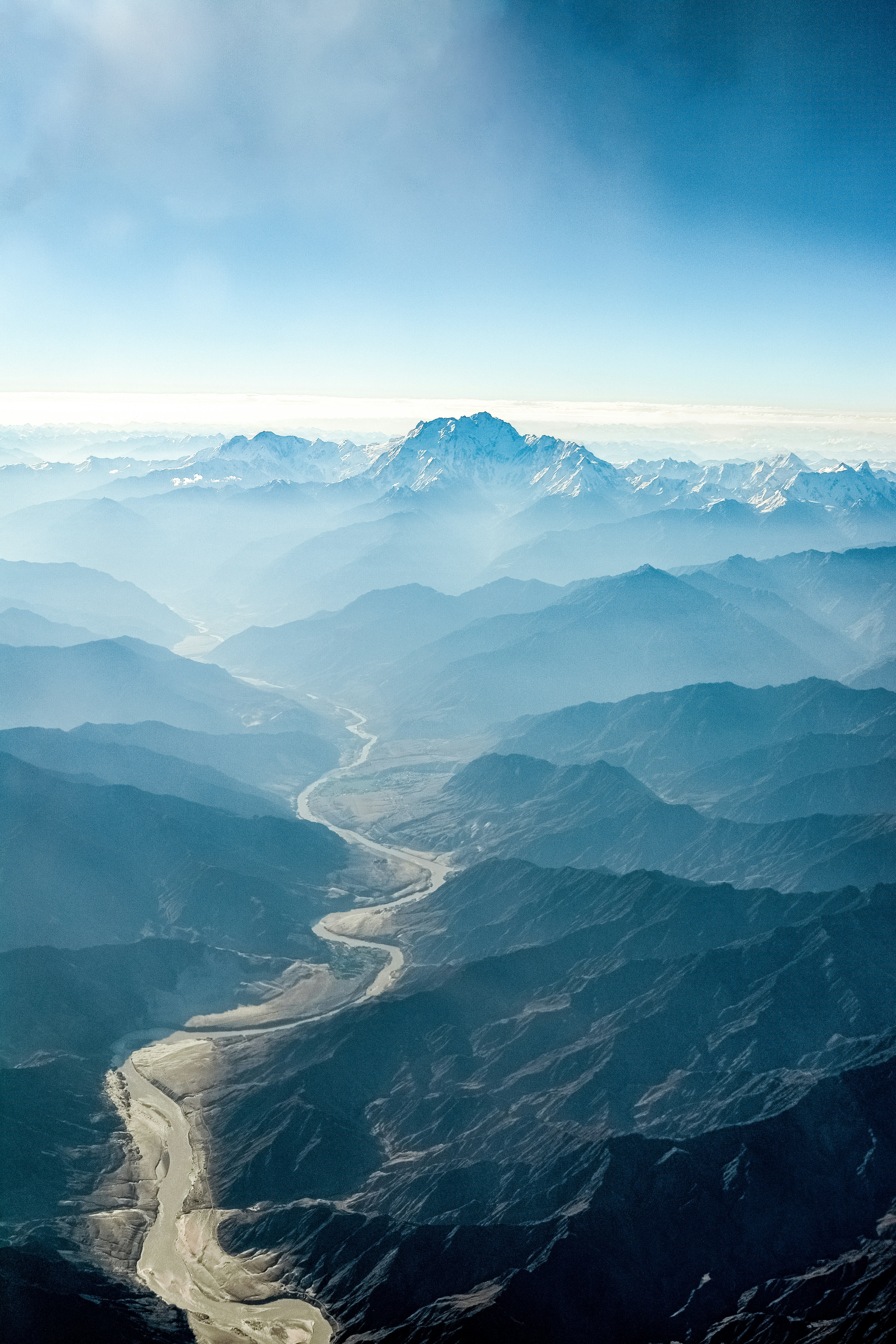 aerial view of snow covered mountains during daytime