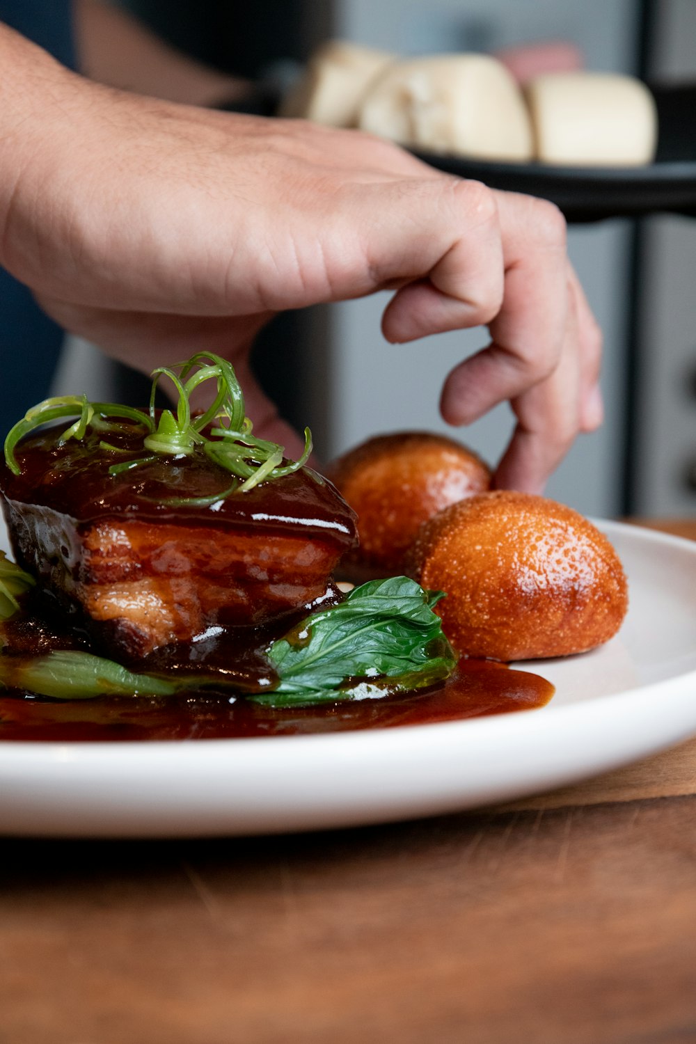 a plate of food on a wooden table