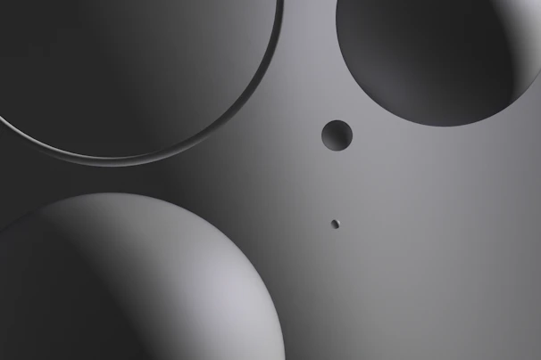 Modern sleek black and silver gradient background with pink accents highlighting fashion products.