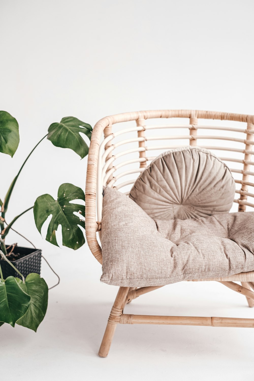 white and gray striped padded armchair