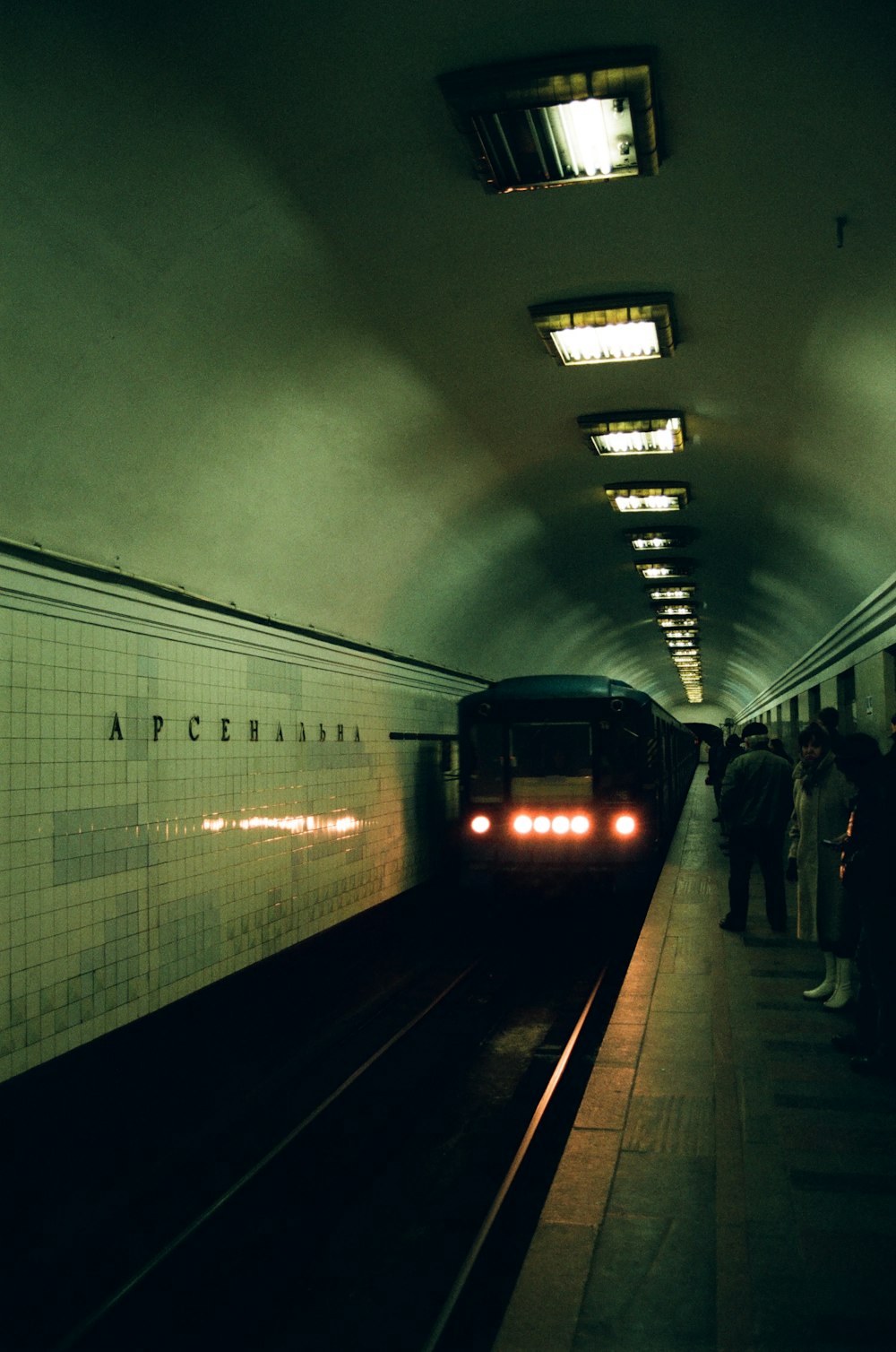 people walking on train station