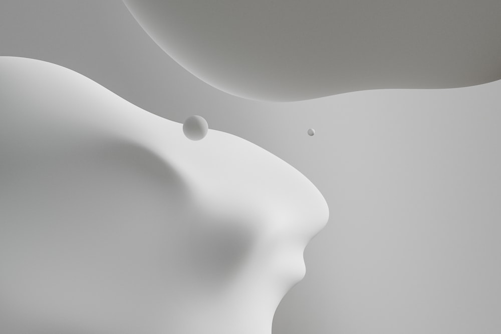 un fondo blanco abstracto con una gota de agua