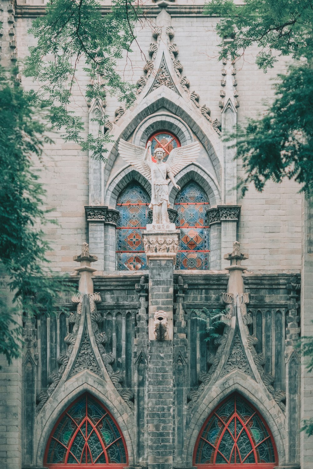 gray concrete church with cross on top