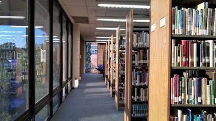 a row of bookshelves filled with lots of books