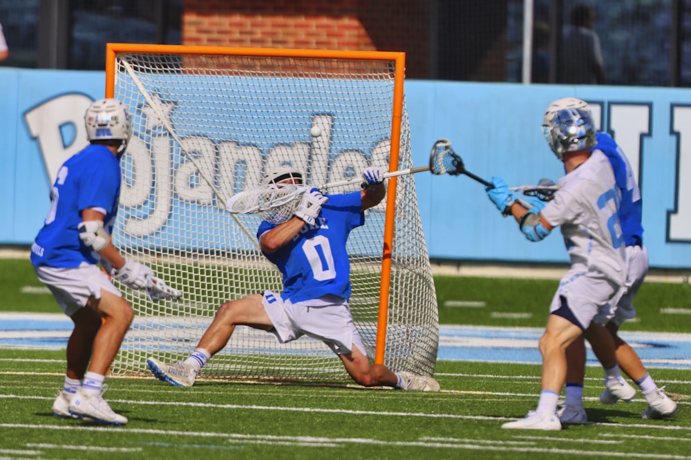 a group of men playing a game of lacrosse