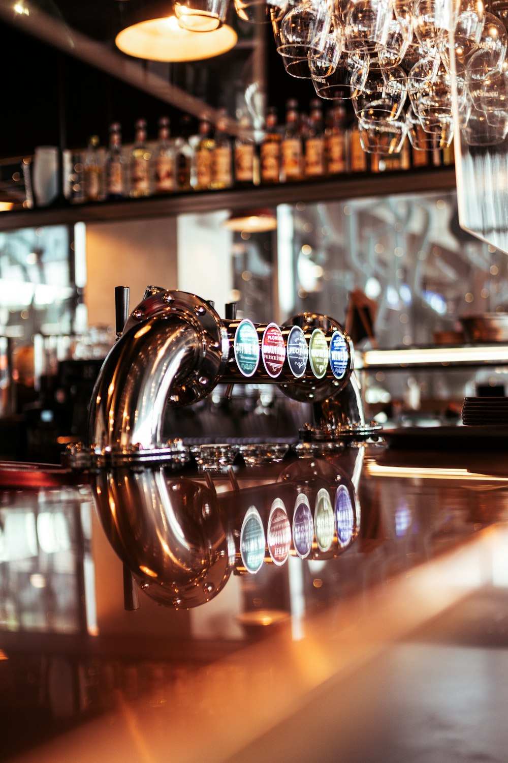 a close up of a beer tap on a bar