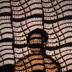 man in black and white striped long sleeve shirt